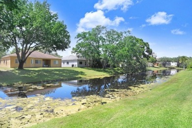 Under contract-accepting backup offers. Immaculate Pool Home on on The Eagles Golf Course and Club in Florida - for sale on GolfHomes.com, golf home, golf lot