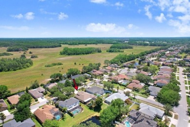 Under contract-accepting backup offers. Immaculate Pool Home on on The Eagles Golf Course and Club in Florida - for sale on GolfHomes.com, golf home, golf lot