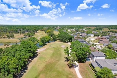 Under contract-accepting backup offers. Immaculate Pool Home on on The Eagles Golf Course and Club in Florida - for sale on GolfHomes.com, golf home, golf lot