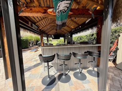 Immaculate Corner Lot with Exceptional Views & Luxury Upgrades! on St. Lucie Trail Golf Club in Florida - for sale on GolfHomes.com, golf home, golf lot