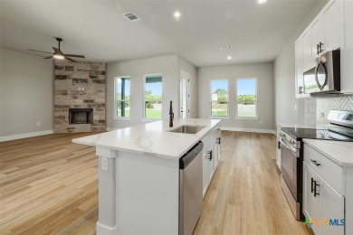 The Longhorn floorplan is spacious and open with patio and porch on Delaware Springs Golf Course in Texas - for sale on GolfHomes.com, golf home, golf lot