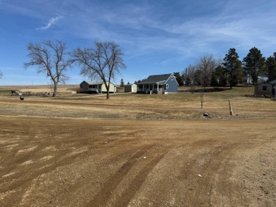 Roy Lake back lot home located on Roykota Dr. Lake City, SD with on Roy View Golf Course in South Dakota - for sale on GolfHomes.com, golf home, golf lot