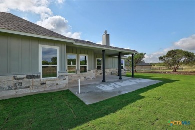 The Longhorn floorplan is spacious and open with patio and porch on Delaware Springs Golf Course in Texas - for sale on GolfHomes.com, golf home, golf lot