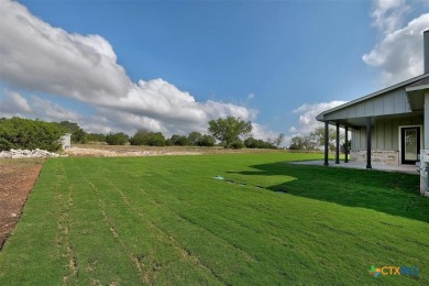 The Longhorn floorplan is spacious and open with patio and porch on Delaware Springs Golf Course in Texas - for sale on GolfHomes.com, golf home, golf lot