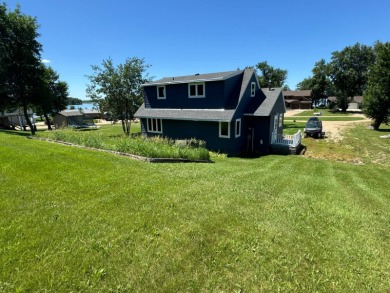 Roy Lake back lot home located on Roykota Dr. Lake City, SD with on Roy View Golf Course in South Dakota - for sale on GolfHomes.com, golf home, golf lot