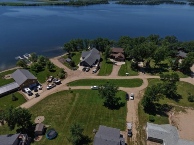 Roy Lake back lot home located on Roykota Dr. Lake City, SD with on Roy View Golf Course in South Dakota - for sale on GolfHomes.com, golf home, golf lot