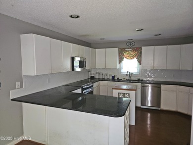 Wonderful location! Located in the Northgreen Golf Course on Northgreen Country Club in North Carolina - for sale on GolfHomes.com, golf home, golf lot