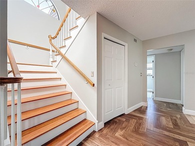 Welcome to 50 Willowood Ln -- a private luxury estate in Oldsmar on East Lake Woodlands Country Club in Florida - for sale on GolfHomes.com, golf home, golf lot