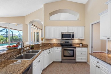 Nestled in a highly sought-after executive golf course community on Pinemoor West Golf Club in Florida - for sale on GolfHomes.com, golf home, golf lot