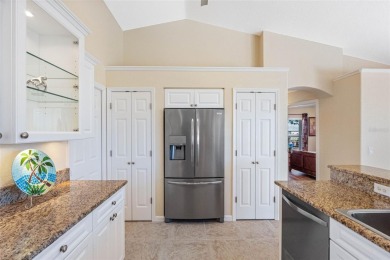 Nestled in a highly sought-after executive golf course community on Pinemoor West Golf Club in Florida - for sale on GolfHomes.com, golf home, golf lot