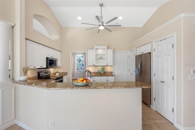 Nestled in a highly sought-after executive golf course community on Pinemoor West Golf Club in Florida - for sale on GolfHomes.com, golf home, golf lot