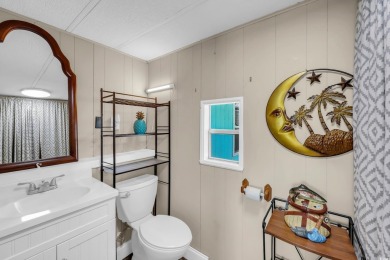 Discover coastal living with this charming property, ideally on Barefoot Resort and Golf Club  in South Carolina - for sale on GolfHomes.com, golf home, golf lot