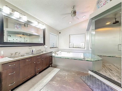 Welcome to 50 Willowood Ln -- a private luxury estate in Oldsmar on East Lake Woodlands Country Club in Florida - for sale on GolfHomes.com, golf home, golf lot