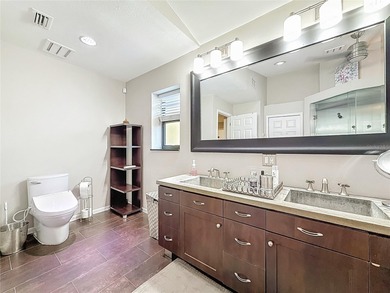 Welcome to 50 Willowood Ln -- a private luxury estate in Oldsmar on East Lake Woodlands Country Club in Florida - for sale on GolfHomes.com, golf home, golf lot