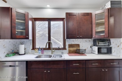 Nestled in the heart of a highly desirable four-season community on The Hideout Golf in Pennsylvania - for sale on GolfHomes.com, golf home, golf lot