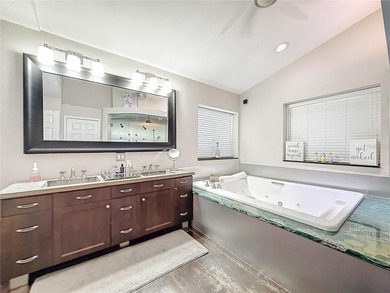 Welcome to 50 Willowood Ln -- a private luxury estate in Oldsmar on East Lake Woodlands Country Club in Florida - for sale on GolfHomes.com, golf home, golf lot