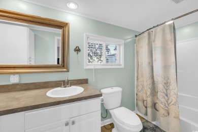 Discover coastal living with this charming property, ideally on Barefoot Resort and Golf Club  in South Carolina - for sale on GolfHomes.com, golf home, golf lot