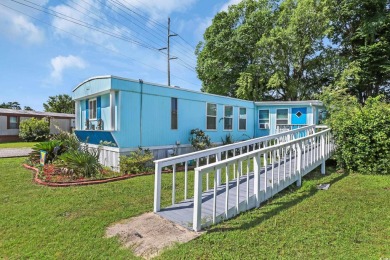 Discover coastal living with this charming property, ideally on Barefoot Resort and Golf Club  in South Carolina - for sale on GolfHomes.com, golf home, golf lot