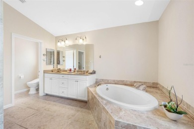 Nestled in a highly sought-after executive golf course community on Pinemoor West Golf Club in Florida - for sale on GolfHomes.com, golf home, golf lot