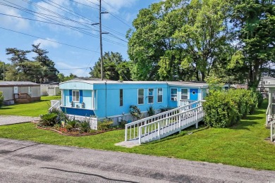 Discover coastal living with this charming property, ideally on Barefoot Resort and Golf Club  in South Carolina - for sale on GolfHomes.com, golf home, golf lot