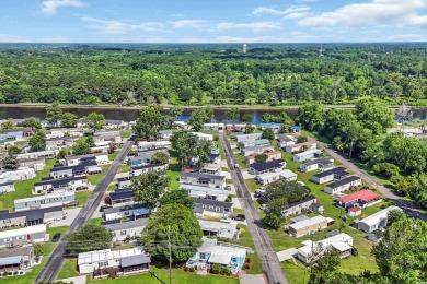 Discover coastal living with this charming property, ideally on Barefoot Resort and Golf Club  in South Carolina - for sale on GolfHomes.com, golf home, golf lot