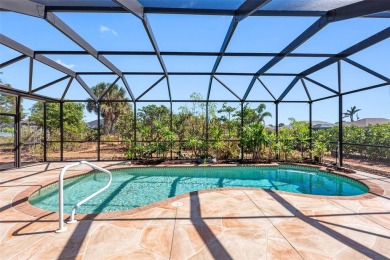Nestled in a highly sought-after executive golf course community on Pinemoor West Golf Club in Florida - for sale on GolfHomes.com, golf home, golf lot