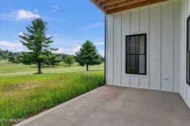 ELEGANT, ENCHANTING, AND EXCEPTIONAL! As you enter, you will be on Dandridge Golf and Country Club in Tennessee - for sale on GolfHomes.com, golf home, golf lot