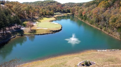 This beautifully appointed 2-bedroom, 2-bathroom fully furnished on Ledgestone Country Club and Golf Course in Missouri - for sale on GolfHomes.com, golf home, golf lot