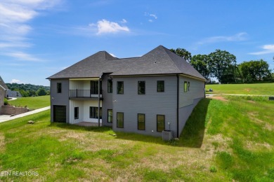 ELEGANT, ENCHANTING, AND EXCEPTIONAL! As you enter, you will be on Dandridge Golf and Country Club in Tennessee - for sale on GolfHomes.com, golf home, golf lot