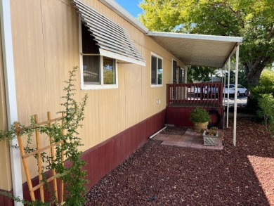 Discover comfort and convenience in this inviting 2-bedroom on Tucker Oaks Golf Course in California - for sale on GolfHomes.com, golf home, golf lot