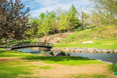 This beautifully appointed 2-bedroom, 2-bathroom fully furnished on Ledgestone Country Club and Golf Course in Missouri - for sale on GolfHomes.com, golf home, golf lot