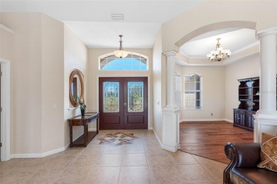 Nestled in a highly sought-after executive golf course community on Pinemoor West Golf Club in Florida - for sale on GolfHomes.com, golf home, golf lot