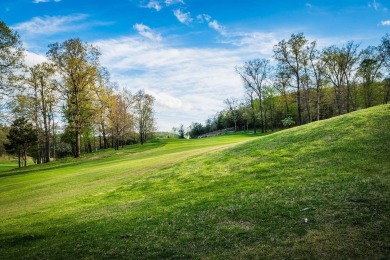 This beautifully appointed 2-bedroom, 2-bathroom fully furnished on Ledgestone Country Club and Golf Course in Missouri - for sale on GolfHomes.com, golf home, golf lot