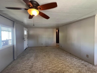 Discover comfort and convenience in this inviting 2-bedroom on Tucker Oaks Golf Course in California - for sale on GolfHomes.com, golf home, golf lot