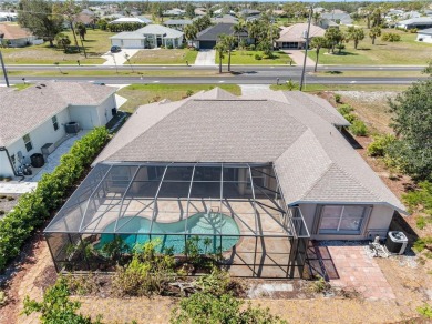 Nestled in a highly sought-after executive golf course community on Pinemoor West Golf Club in Florida - for sale on GolfHomes.com, golf home, golf lot