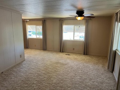 Discover comfort and convenience in this inviting 2-bedroom on Tucker Oaks Golf Course in California - for sale on GolfHomes.com, golf home, golf lot