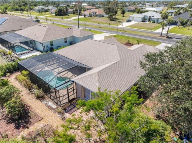 Nestled in a highly sought-after executive golf course community on Pinemoor West Golf Club in Florida - for sale on GolfHomes.com, golf home, golf lot