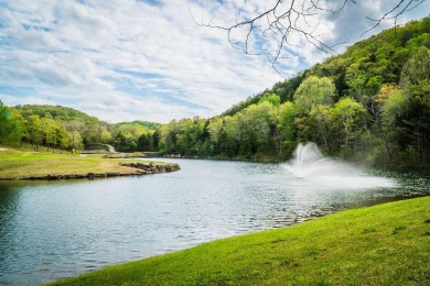 This beautifully appointed 2-bedroom, 2-bathroom fully furnished on Ledgestone Country Club and Golf Course in Missouri - for sale on GolfHomes.com, golf home, golf lot