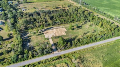 Welcome to this gorgeous, meticulously groomed, ready-to-build on Beeches Golf Club  in Michigan - for sale on GolfHomes.com, golf home, golf lot