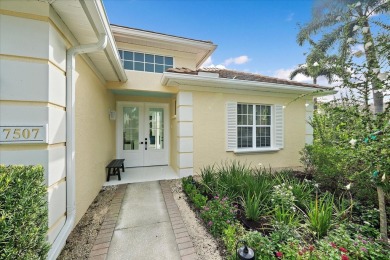 Nestled on a premier cul-de-sac lot within the highly coveted on University Park Country Club in Florida - for sale on GolfHomes.com, golf home, golf lot
