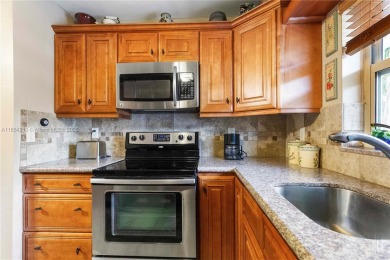 Purchase with 5% down.This well maintained 2-bedroom, 2-bathroom on Eco Golf Club in Florida - for sale on GolfHomes.com, golf home, golf lot