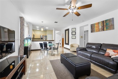 Beautifully appointed 5-bedroom, 2.5-bath residence in the on Weston Hills Country Club in Florida - for sale on GolfHomes.com, golf home, golf lot