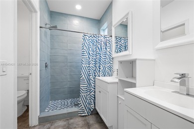 Beautifully appointed 5-bedroom, 2.5-bath residence in the on Weston Hills Country Club in Florida - for sale on GolfHomes.com, golf home, golf lot