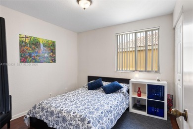 Beautifully appointed 5-bedroom, 2.5-bath residence in the on Weston Hills Country Club in Florida - for sale on GolfHomes.com, golf home, golf lot