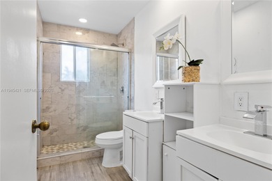 Beautifully appointed 5-bedroom, 2.5-bath residence in the on Weston Hills Country Club in Florida - for sale on GolfHomes.com, golf home, golf lot