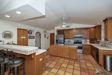 Nestled in the exclusive community of The Dunes, this beautiful on Desert Hills Golf Course in Arizona - for sale on GolfHomes.com, golf home, golf lot