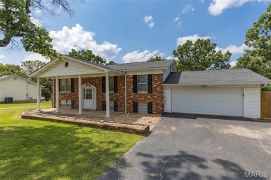 Welcome to your dream home in the sought-after Terre Du Lac on Terre Du Lac Golf and Country Club in Missouri - for sale on GolfHomes.com, golf home, golf lot