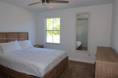 Paradise Awaits! Available March 2026 - Enjoy this beautifully on Ibis Golf and Country Club in Florida - for sale on GolfHomes.com, golf home, golf lot