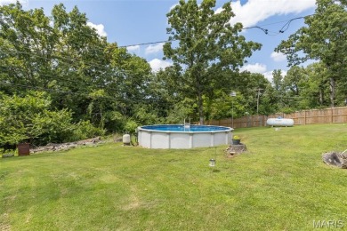 Welcome to your dream home in the sought-after Terre Du Lac on Terre Du Lac Golf and Country Club in Missouri - for sale on GolfHomes.com, golf home, golf lot