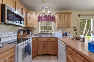 Cape Cod Style Home on nearly 6 Acres across the road from on Stoneridge Golf Club in Idaho - for sale on GolfHomes.com, golf home, golf lot
